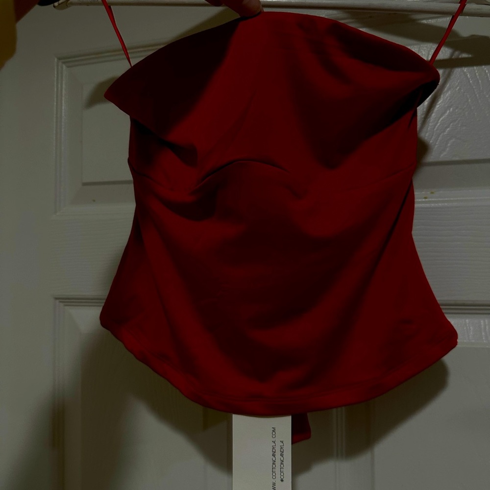Red tube top, size medium, tie back.